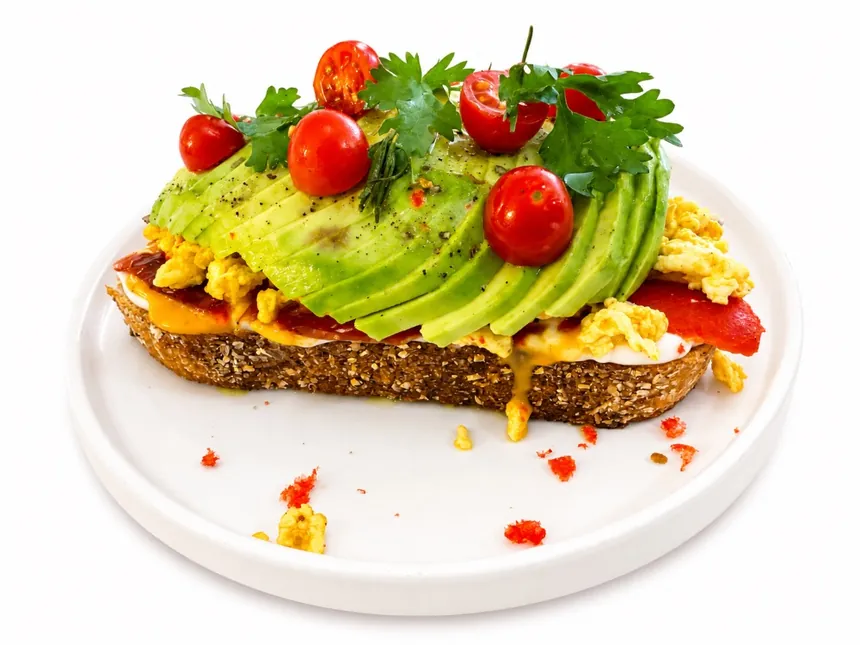 Egg and Avocado Toast with avocado slices and cherry tomatoes